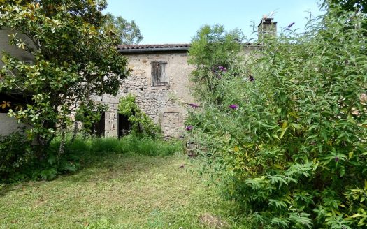 Charming stone village house not overlooked with flowered garden and trees.