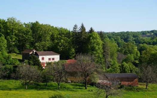Magnificent 19th century estate nestled in the tranquility of nature and adorned with a pond.