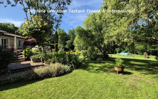 Charming 3 bedrooms house with a beautiful landscaped garden and carport