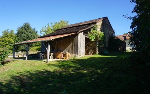 Old farmhouse nestled in the heart of lush, unspoiled nature.