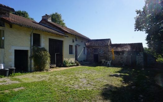 Old farmhouse nestled in the heart of lush, unspoiled nature.
