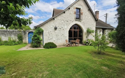 Old 19th century house, enclosed garden and landscape.
