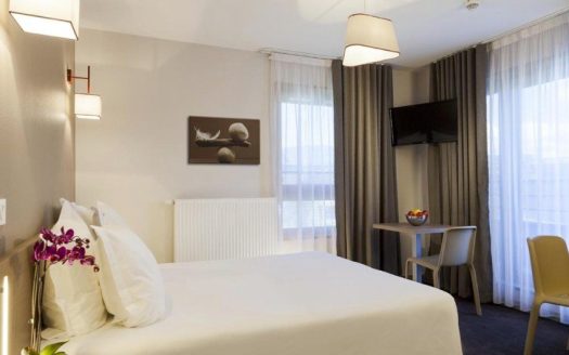 INVESTISSEMENT LOCATIF – ANNEMASSE – Résidence de Tourisme Nehô Suites – Porte de Genève – 6,12 % de rentabilité