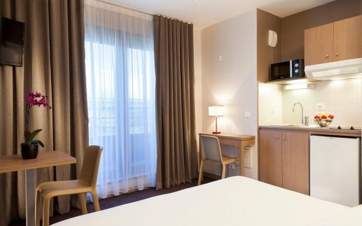 INVESTISSEMENT LOCATIF – ANNEMASSE – Résidence de Tourisme Nehô Suites – Porte de Genève – 6,12 % de rentabilité