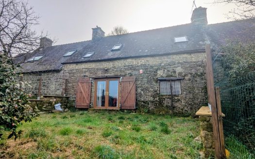 Country cottage with a barn