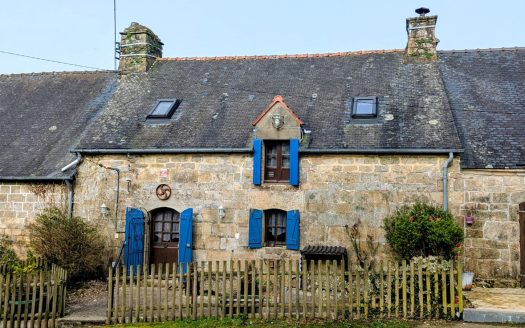 Country cottage with a barn