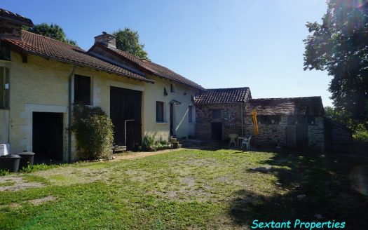 Old farmhouse nestled in the heart of lush, unspoiled nature.