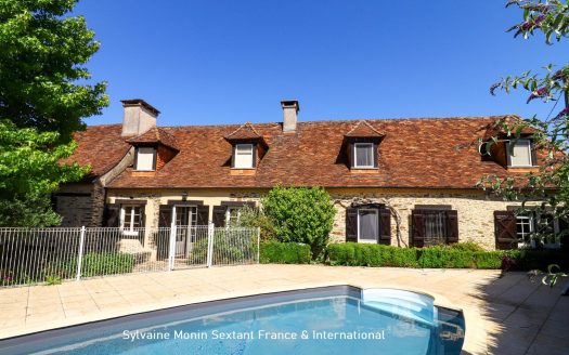 Character property in stone with swimming pool and barn, combining old-world charm and contemporary comfort
