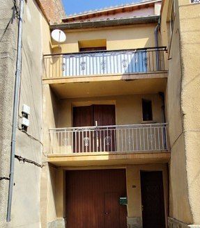 Village House with Garage and Balconies – Renovation Project