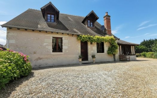 Old 19th century house, enclosed garden and landscape.